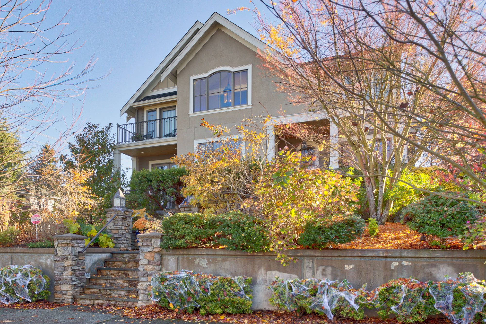 A street view of a new, large home created by Exterior Crew, LLC in Seattle, WA